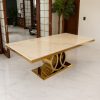 Mesa de Comedor Poseidon Gold en ambiente elegante